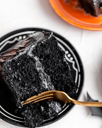 chocolate pumpkin cake slice with black frosting